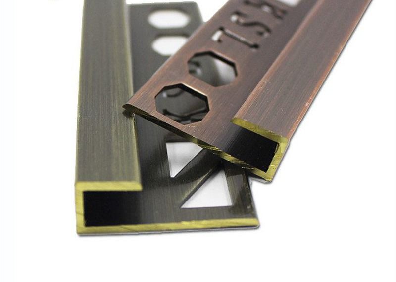 Disposizione d'ottone di lusso dell'alta società delle mattonelle del metallo della retro disposizione d'ottone bronzea delle mattonelle